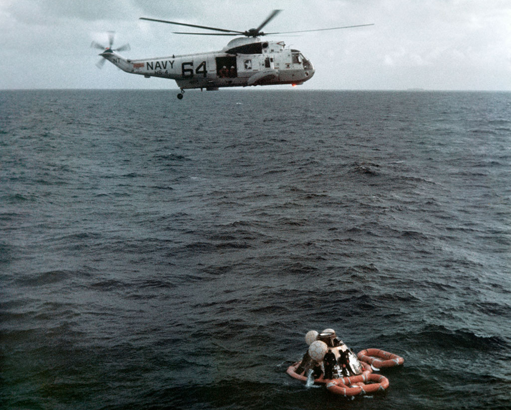 Helicopter rescues the Apollo 11 capsule and crew from the ocean