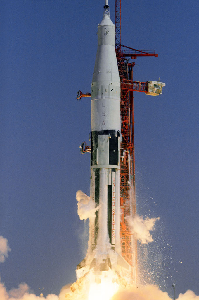 Apollo rocket taking off the launch pad