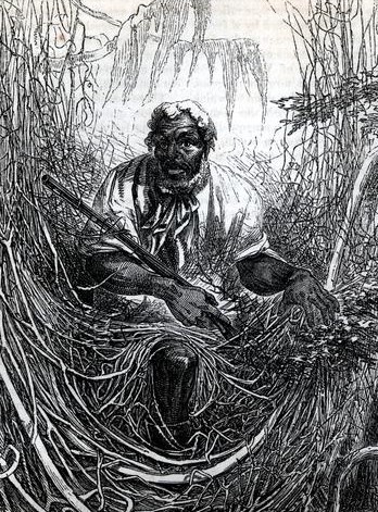 African American man holding a gun emerging from a thick swamp